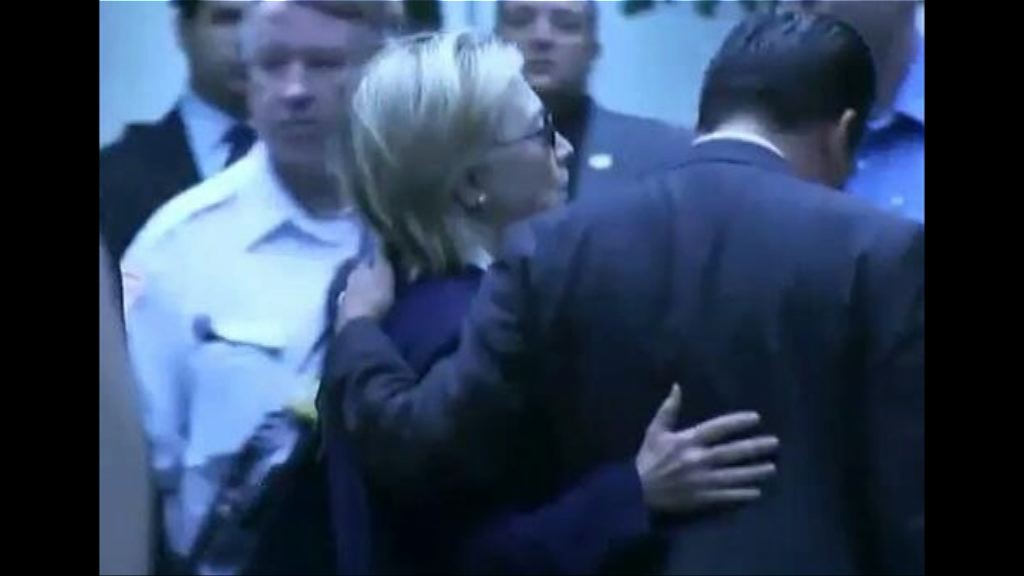 希拉里出席911悼念活動時不適