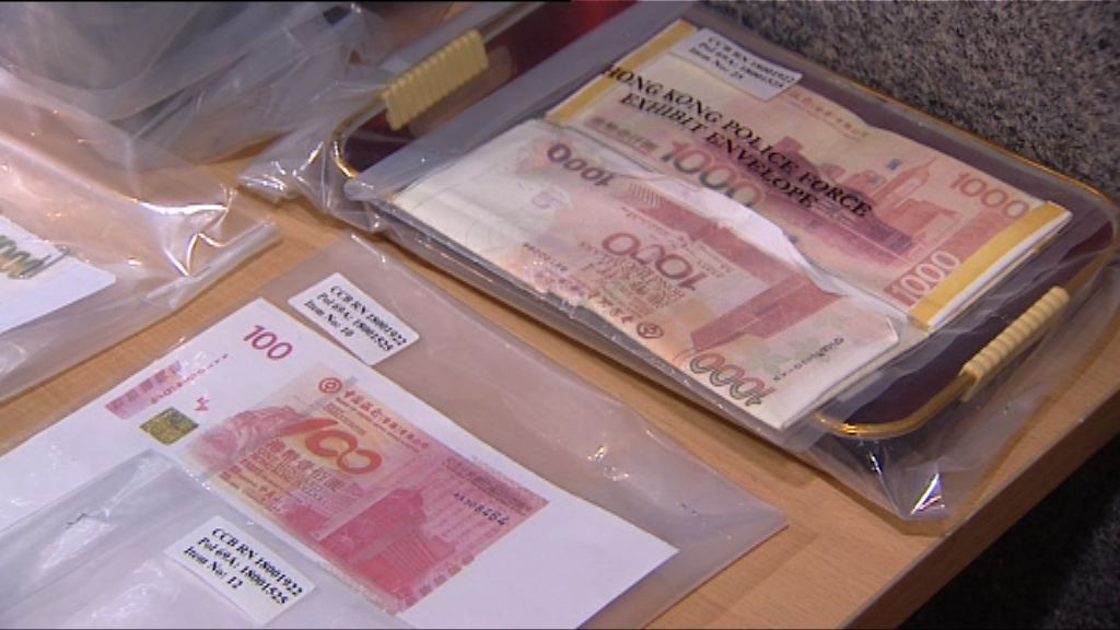 警方土瓜灣拘外籍男女檢偽鈔