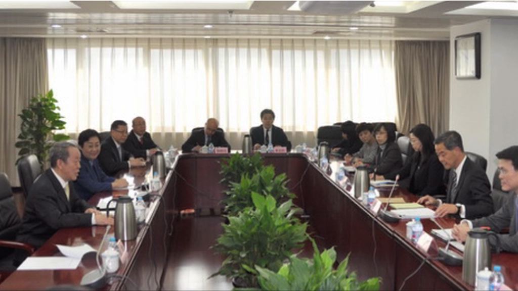 梁振英訪港澳辦與王光亞會面