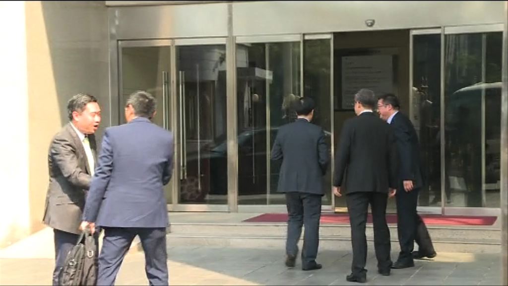 李家超盧偉聰等到訪港澳辦