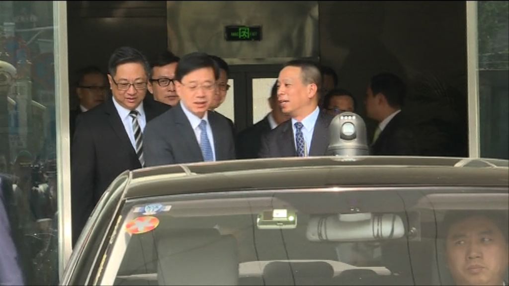 李家超與多名紀律部隊首長到訪港澳辦