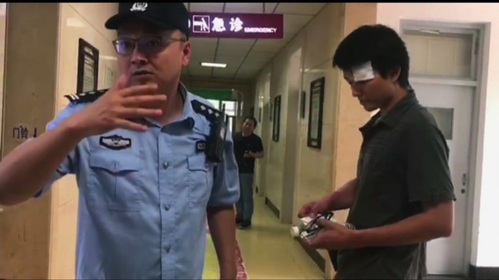 本台駐京攝影師共被扣約四小時才獲准離開