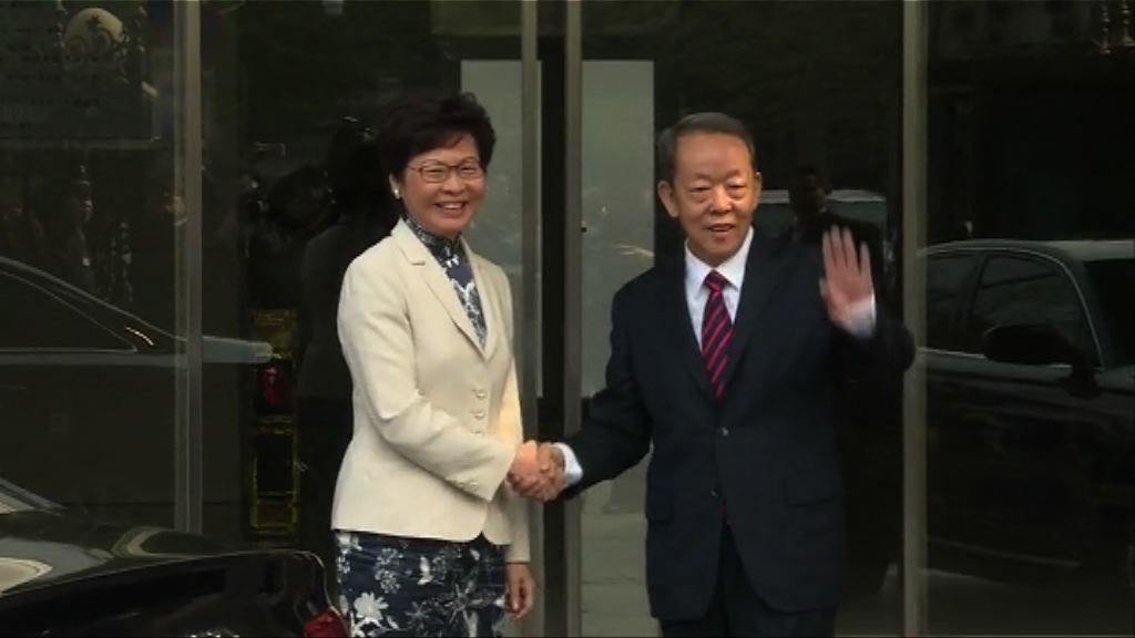 林鄭月娥到訪港澳辦與王光亞會面