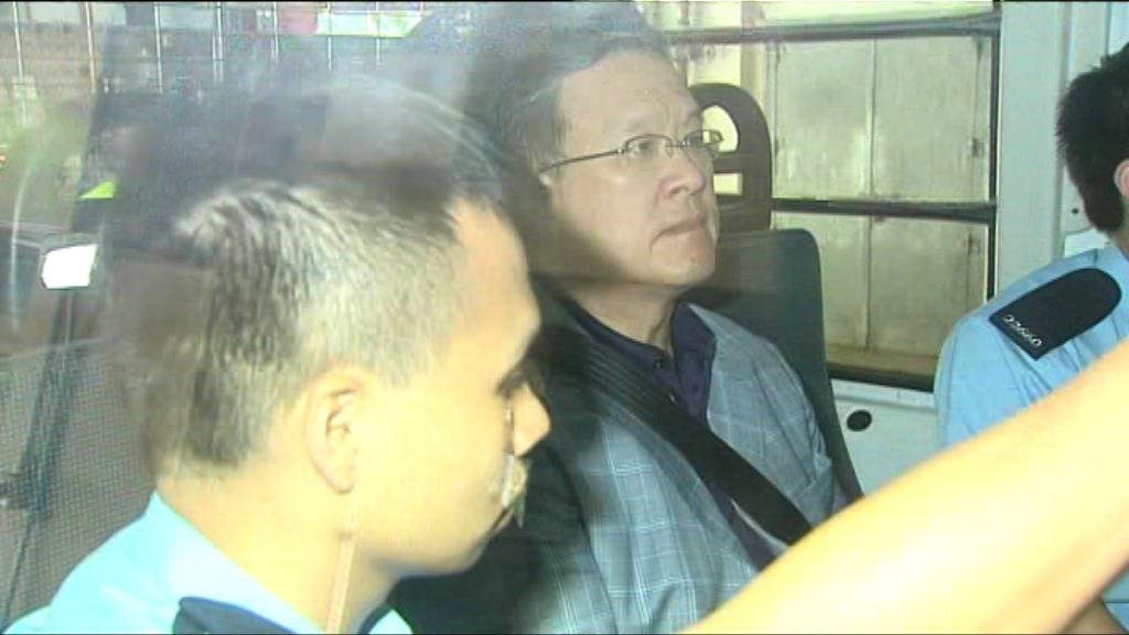 張震遠涉詐騙及串謀欺詐　由警車送法院提堂