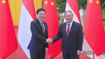 李強接見訪華的新加坡總理黃循財