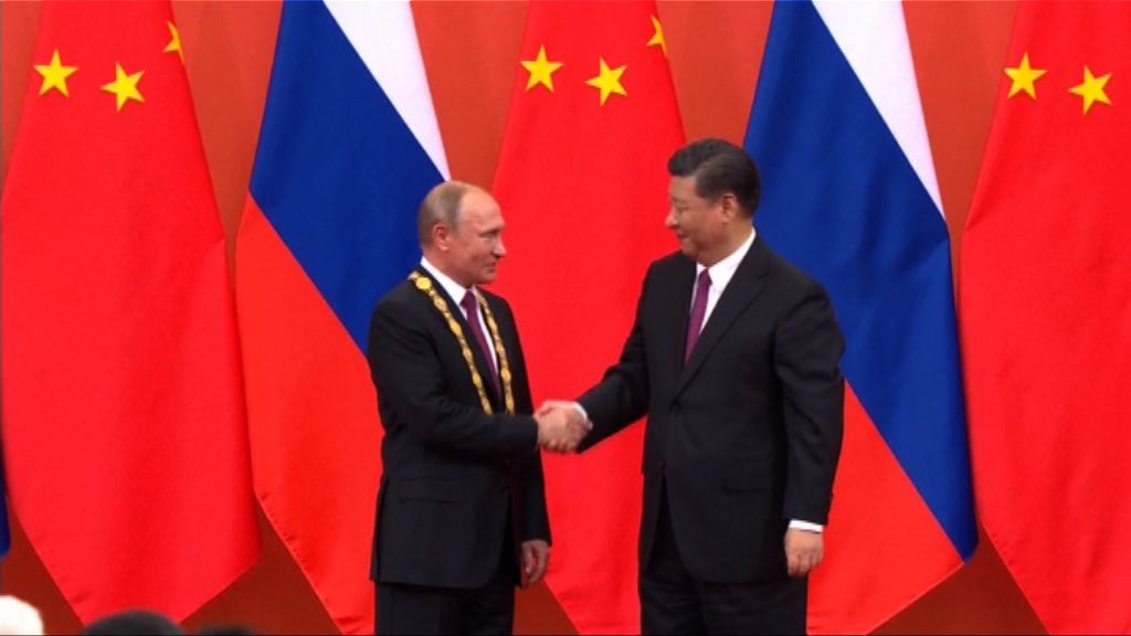 習近平向普京頒予中國友誼勳章