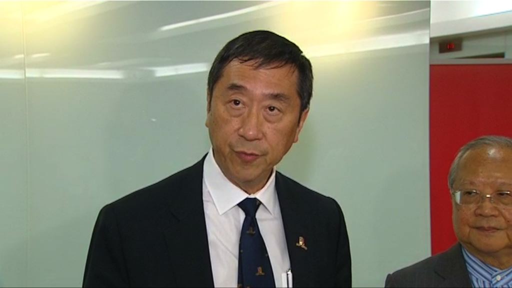 沈祖堯促中大學生會移除有關標語