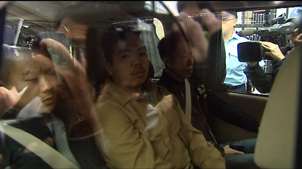 警方拘九人涉中聯辦反釋法遊行