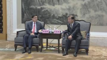 李家超出席東莞工商界高峰論壇 又與東莞市委書記肖亞非會面