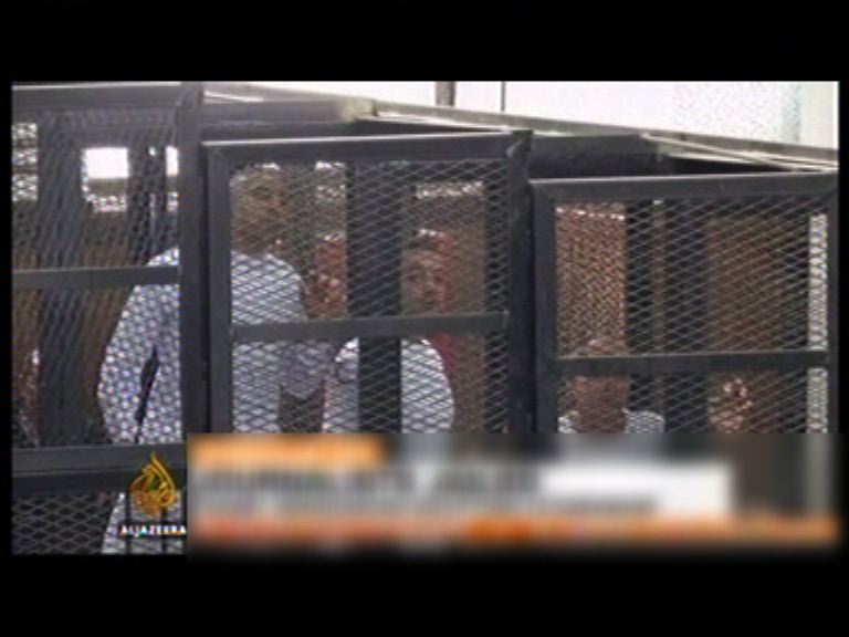 三名半島電視台記者被判監三年