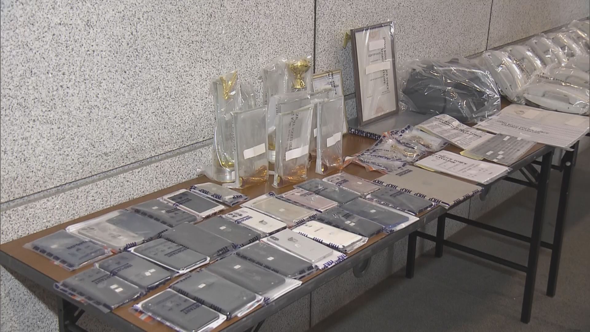 警拘十八人涉串謀詐騙及洗黑錢