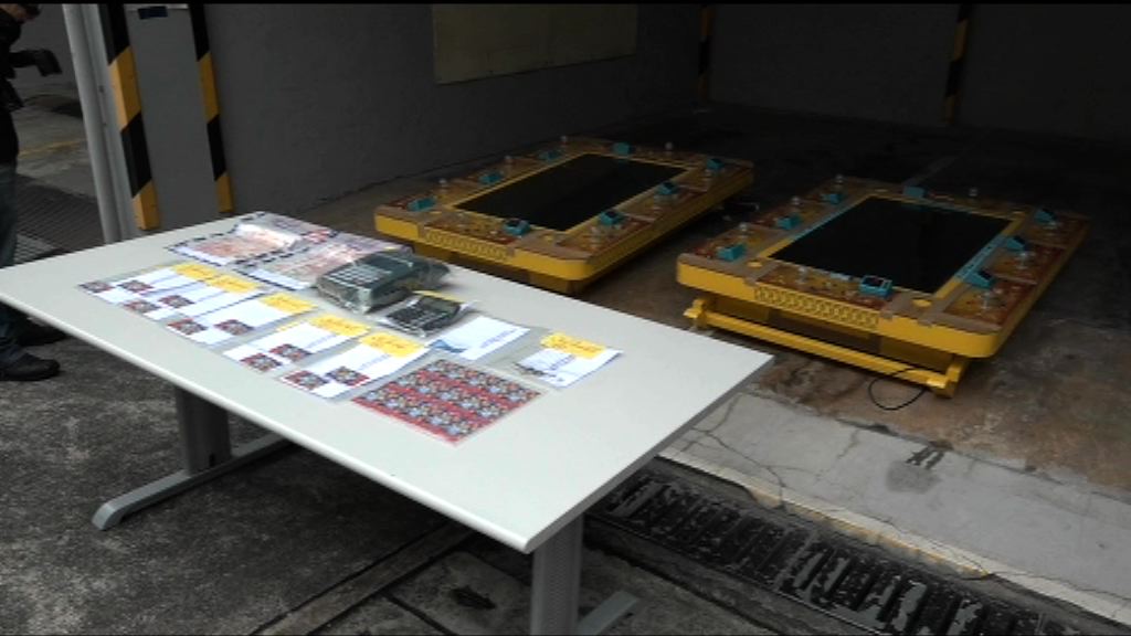 警西九龍區掃蕩釣魚機賭檔拘52人