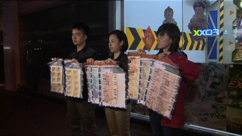 警方荃灣破釣魚機賭檔拘56人