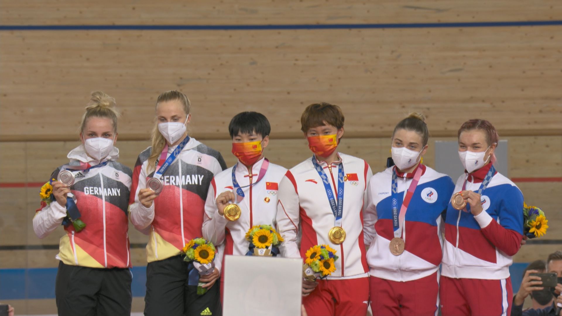 中國保證不會再有運動員扣上毛澤東襟章領獎