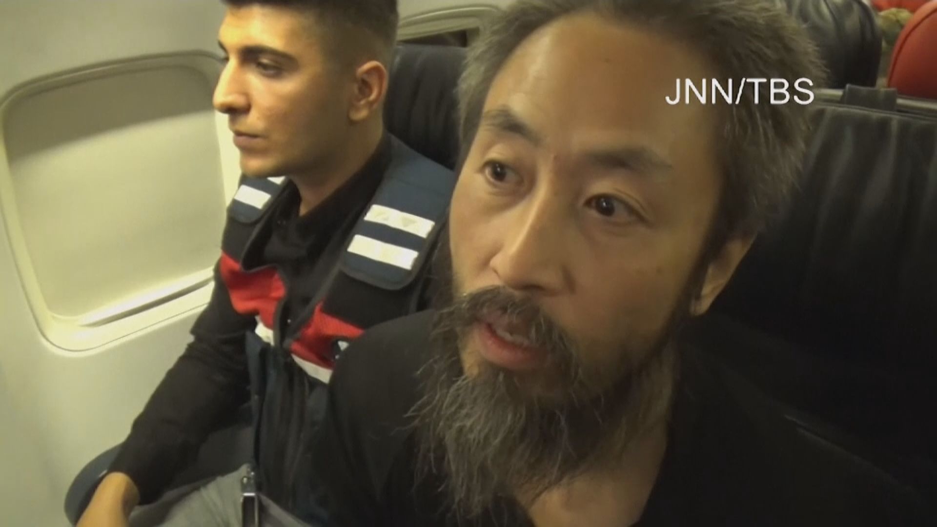 日本記者安田純平返抵東京