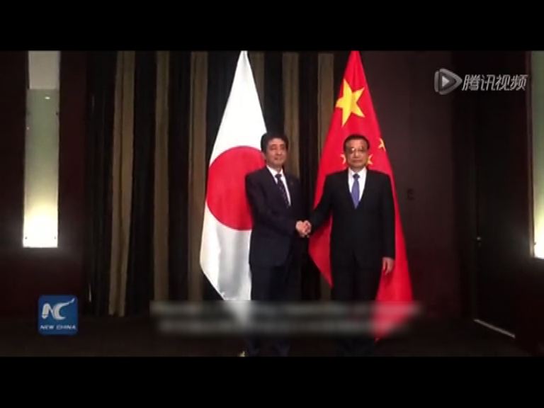 李克強應邀與安倍晉三會面