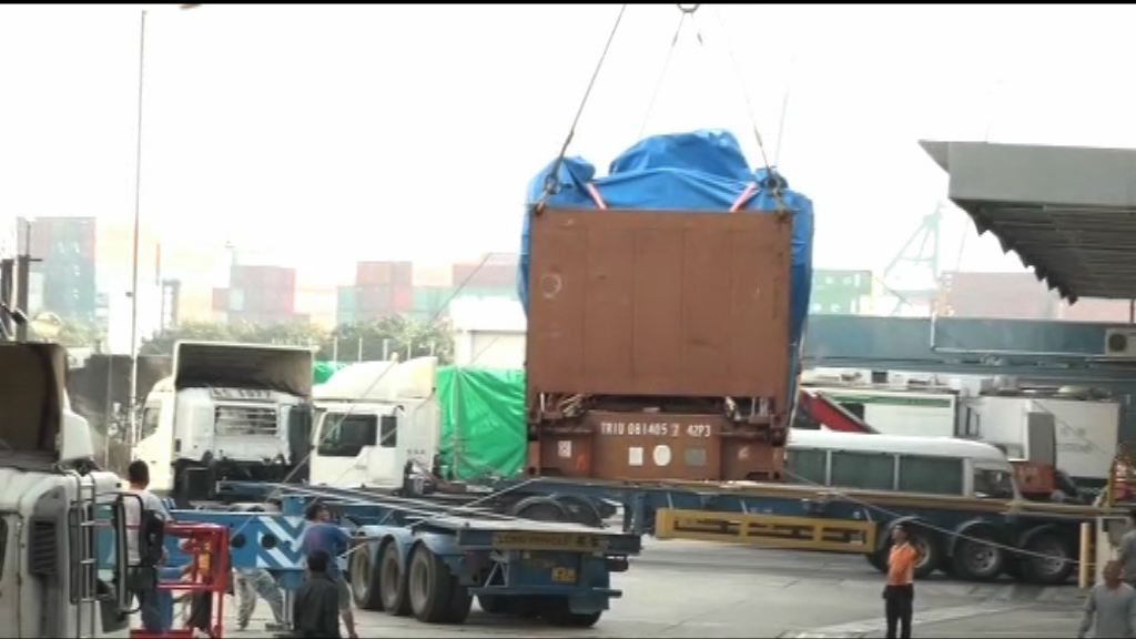 九部裝甲車準備運離香港交還新加坡