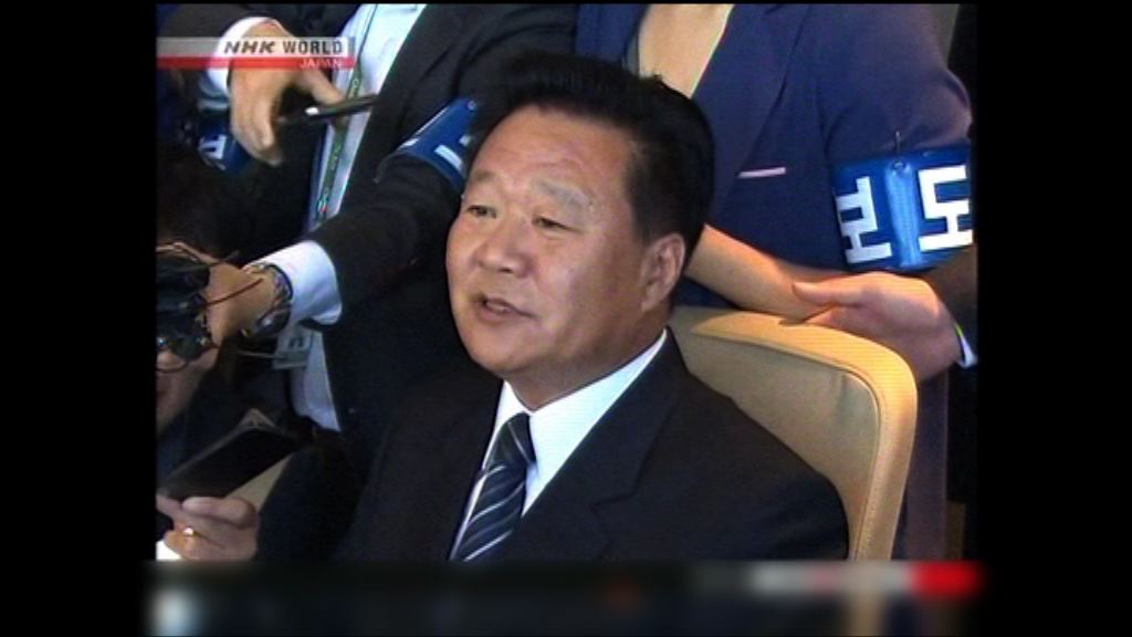 崔龍海率奧運代表團前往巴西