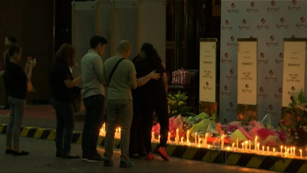 馬尼拉槍擊縱火　市民悼念死難者