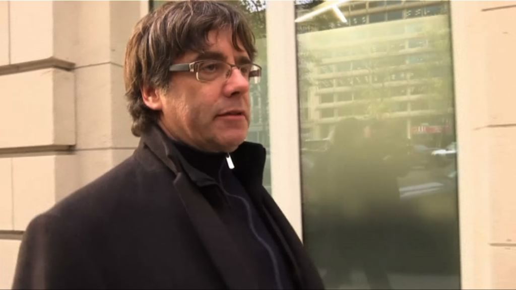 普伊格蒙特向比利時警方投案