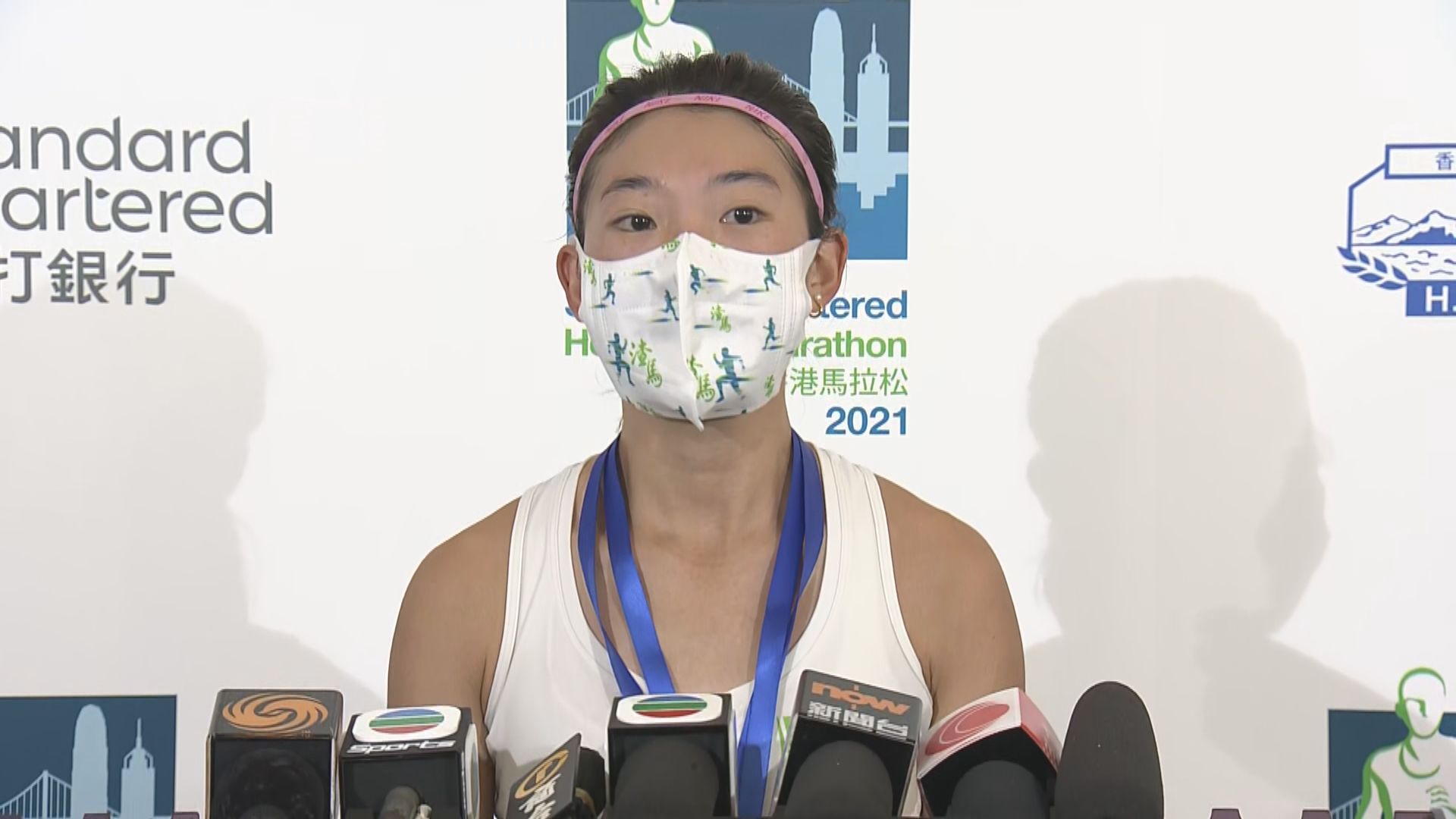 黃子圖及羅映潮分奪10公里跑男女子組冠軍