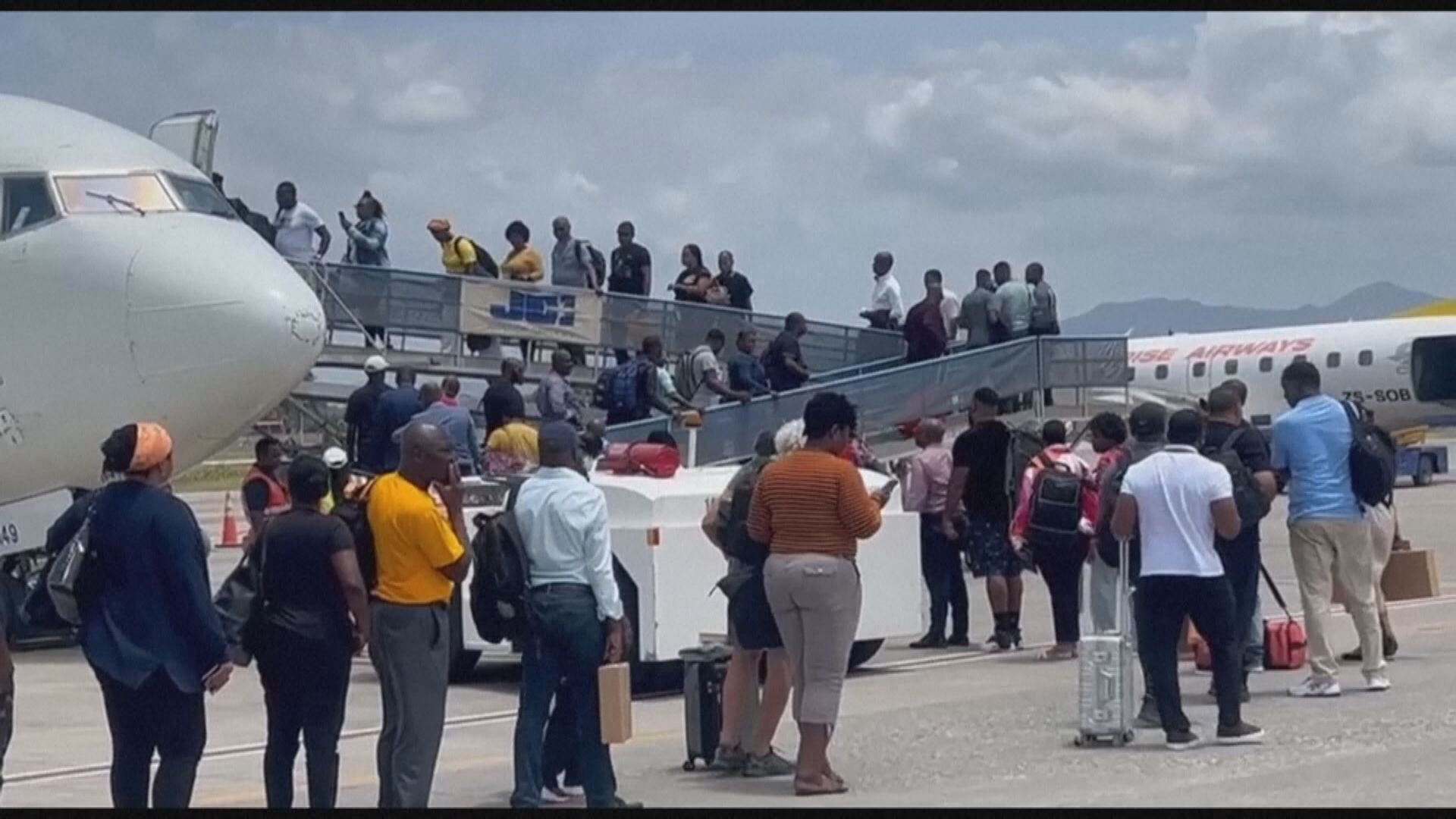 12國入境美國禁令生效前夕　海地機場現離國人潮