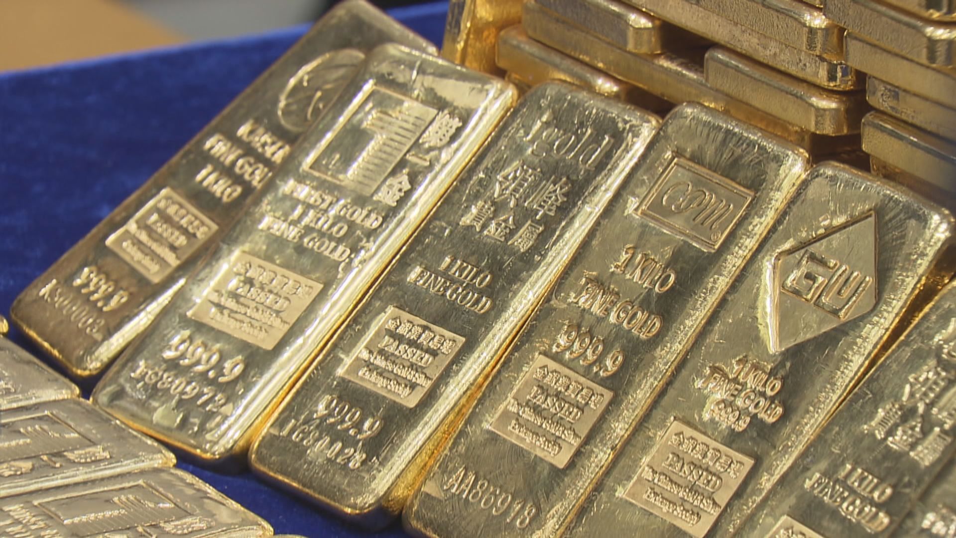 紐約12月期金微跌收市