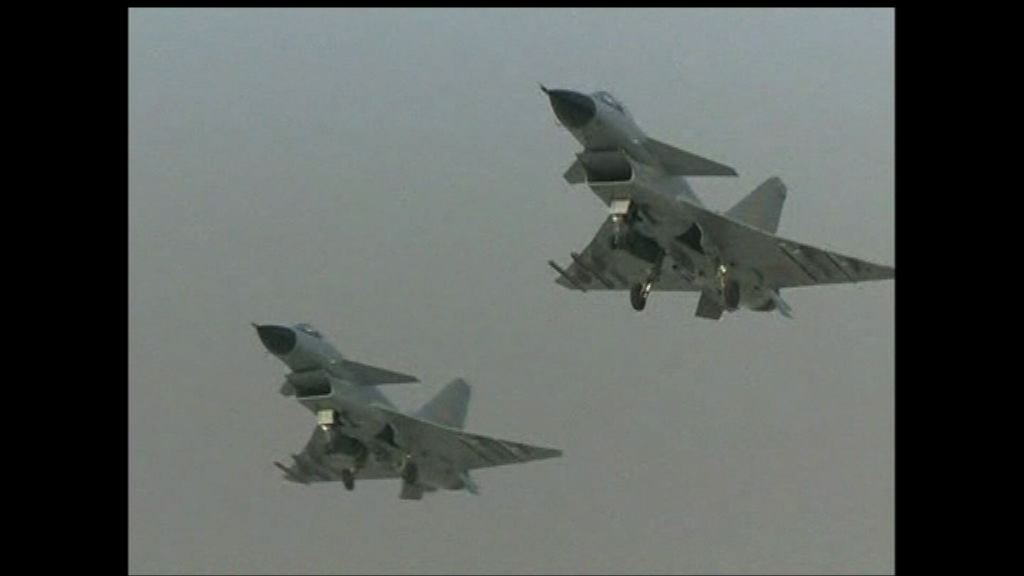 美軍指偵察機遭解放軍戰機攔截