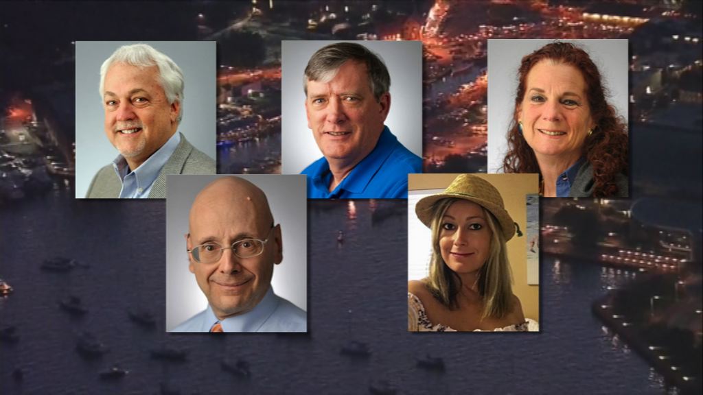 美報社槍擊案居民悼念五名死者